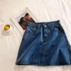 Sa65890fe0a1f4a518078d1ca287b12a5u.webp Women's Summer Skirt Casual Big Size Jeans A-line Short Skirt High Waist Denim Vintage Tassel Female Clothing DURIKIES
