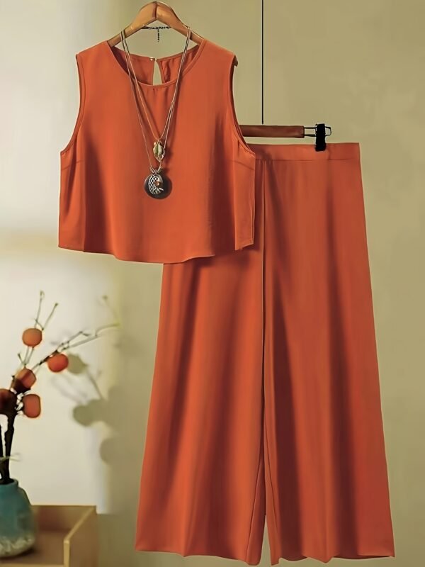 3afa162b-6d05-4d7e-a277-14fcd115bfdc.jpg Women's Elegant Orange Skirt Set – Stylish Warm-Tone Fashion Outfit