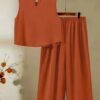49dce4ce-1ec2-459e-b523-d561ecd5d215.jpg Women's Elegant Orange Skirt Set – Stylish Warm-Tone Fashion Outfit