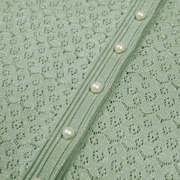 S23e07860f493408bb078e8de6fe1cd3bx.webp High Quality Elastic Knitted New Fashionable Round Neck Short Sleeved Shiny Silk Pearl Button Slim Fit Temperament Women's Dress