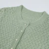 S628b3c3ab1a243d98fd684397fec388cq.webp High Quality Elastic Knitted New Fashionable Round Neck Short Sleeved Shiny Silk Pearl Button Slim Fit Temperament Women's Dress