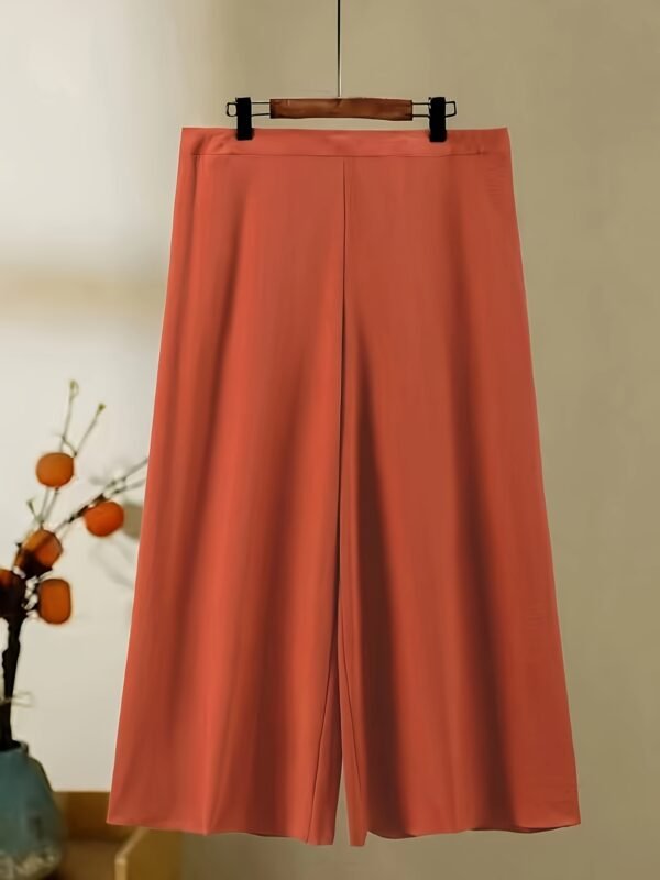bb9f2771-1fc1-4de8-9eac-0c7538cd0cce.jpg Women's Elegant Orange Skirt Set – Stylish Warm-Tone Fashion Outfit